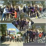 رکاب زنی دوچرخه سواران به مناسبت هفته دفاع مقدس در حاجی آباد